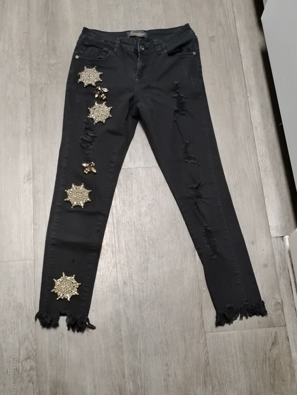 Black Skinny Jeans with Gold Medallion Embellishments